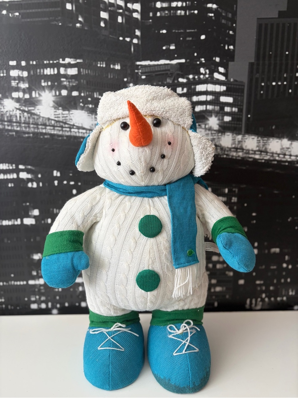Plush Snowman Holiday Decor in White & Blue with Green Accents
